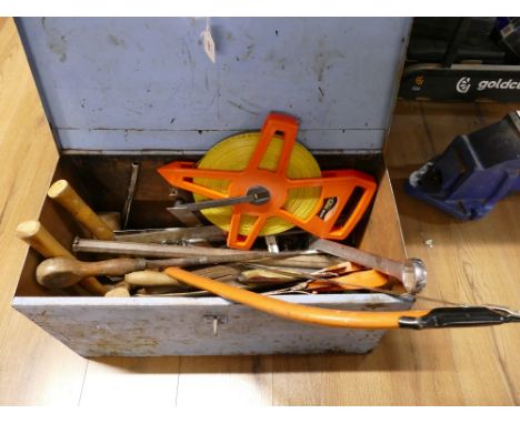 Blue metal chest containing a Lufkin 100 m tape measure, quantity of hammers, hand tools, saws etc