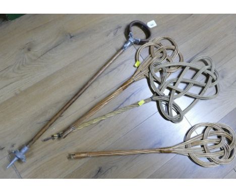 Shooting stick and three carpet beaters 