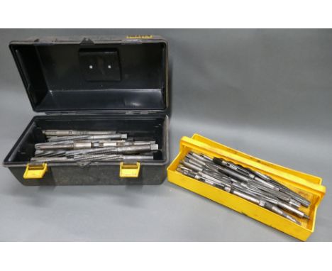 Toolbox containing quantity of various sized metal working reamers. 