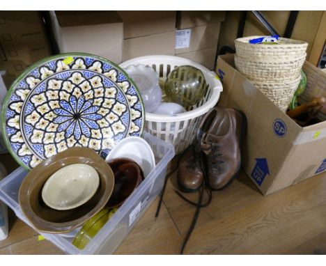 Three boxes of ceramics, kitchenware, glass light shades, wicker bins, work shoes, cutlery