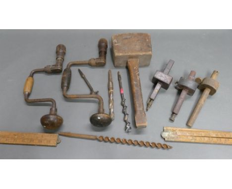 Selection of vintage hand tools which include mallet, brace drills etc.