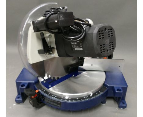Ferm 10" compound mitre saw in box.