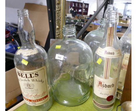 Empty 4.5L Bells Scotch Whisky bottle, large empty German wine bottle and glass demi-john