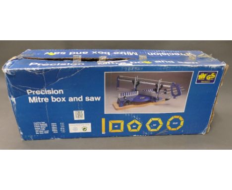 Precision mitre box and saw. 