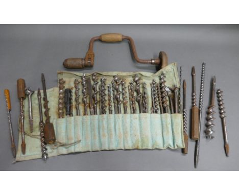 A selection of vintage wood auger drills and vintage Stanley no144 ratchet brace drill. 