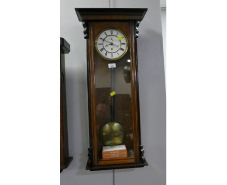 Mahogany wall clock with ceramic face 