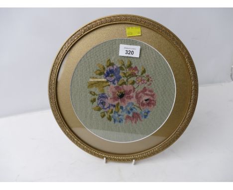 Framed circular floral tapestry, 30 cm diameter, dated to back 1923