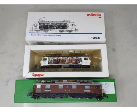 A Swiss HO ROCO 43710 Co-Co electric Locomotive and a boxed Marklin 1998,5 Bo-Bo electric Locomotive 