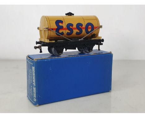 A boxed Hornby Dublo D1 buff 'Esso' Tanker, Nr M barrel perfect with slight marks on one end of casting of tanker, box superb