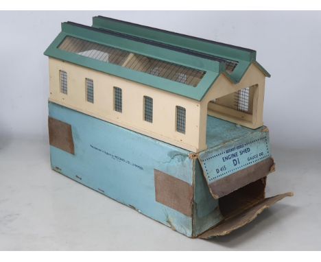 A rare boxed Hornby Dublo pre-war Engine Shed, Nr M-M, box generally G, one end still sealed, other end missing one tuck in f