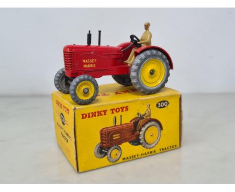 A boxed Dinky Toys No.300 Massey-Harris Tractor, Ex, box Ex plus 