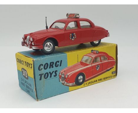 A boxed Corgi Toys No.213S Jaguar 2.4 Fire Service Car in over sticker box with club leaflet, Nr M-M, box Ex 