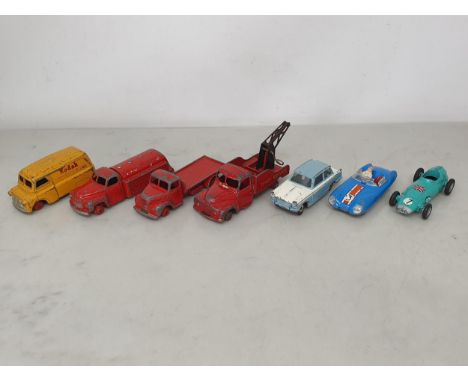 Five unboxed, playworn Dinky Toys including Bedford Kodak Van, Triumph Herald, Mobilgas Tanker, Flat Truck and Breakdown Lorr