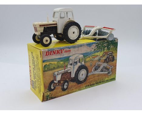 A boxed Dinky Toys No.325 David Brown Tractor with Disc Harrow, Nr M, box Ex with packing 