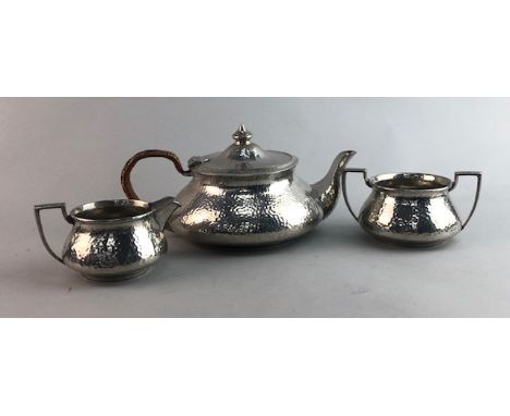 BEATEN PEWTER THREE PIECE TEA SERVICE