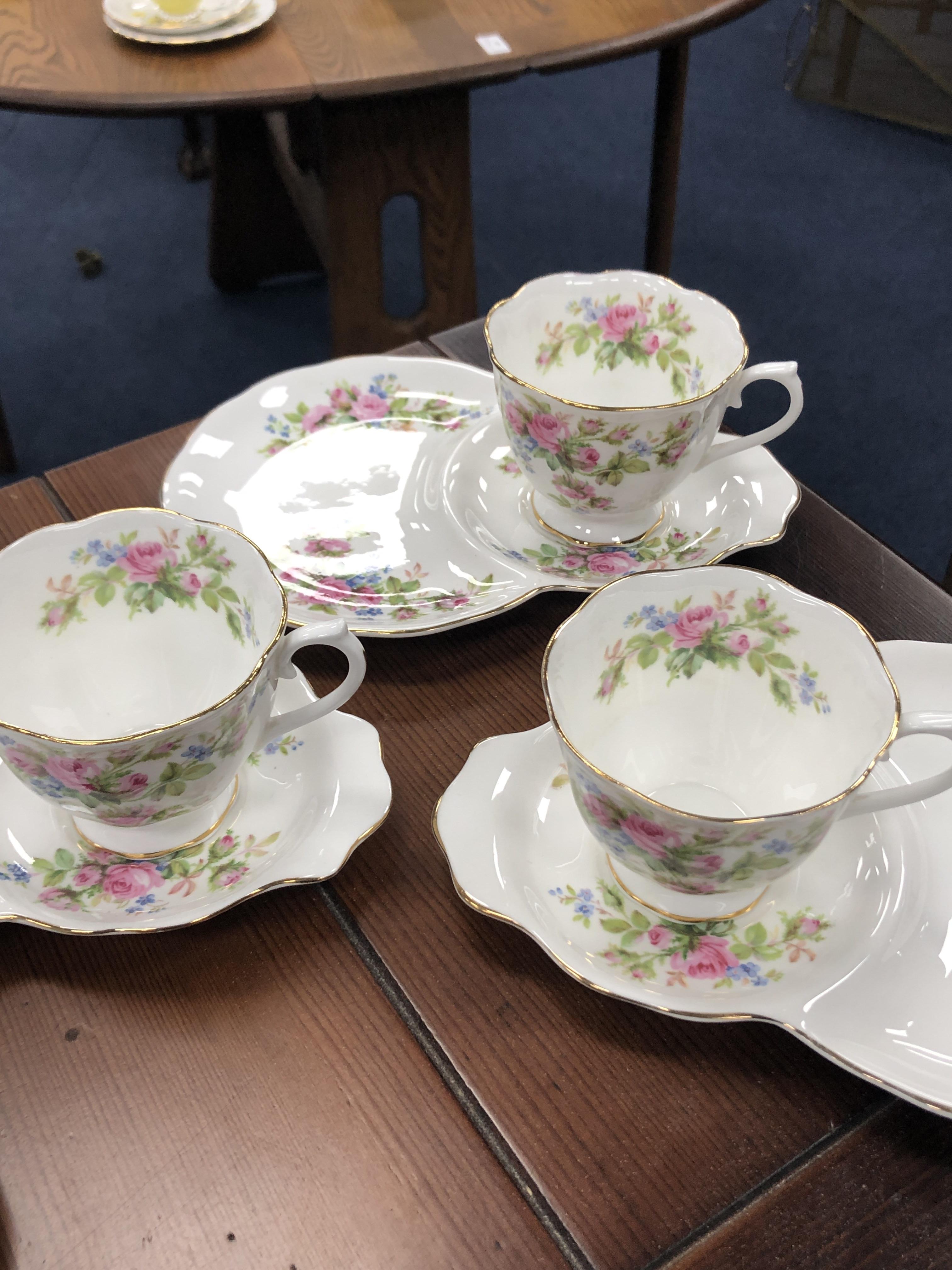 TWO PART TEA SERVICES, comprising 6 cups and saucers by Royal Albert