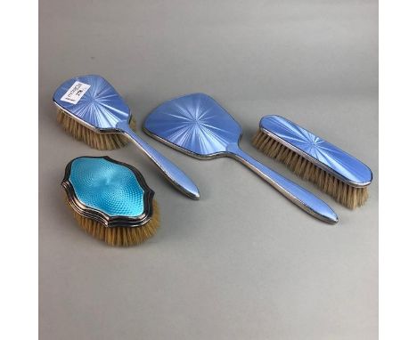 SILVER AND ENAMEL DRESSING TABLE SET, along with a similar bruch (4)