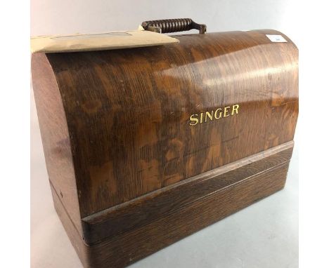 MANUAL SINGER SEWING MACHING, cased in oak