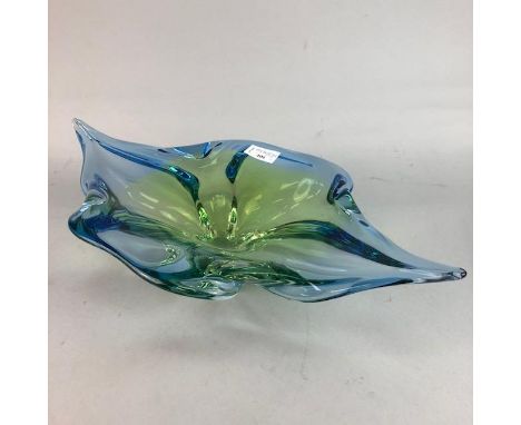 LEAF SHAPED COLOURED GLASS CENTREPIECE, 45cm high, along with a coloured glass bowl inscribed 'Walker', a Caithness paperweig