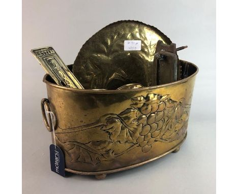 AN EMBOSSED BRASS DOUBLE HANDLED OVAL PLANTER, along with a group of other brassware