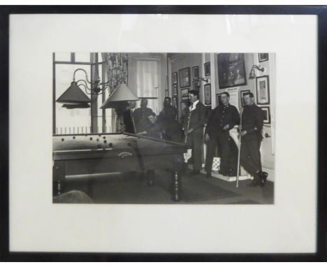 SOLDIERS AT THE NCO CLUB IN EATON SQUARE, silver gelatin archival fibre print, 54cm x 45cm overall, framed and glazed. 