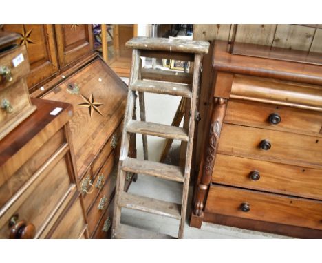 A traditional set of wooden step ladders