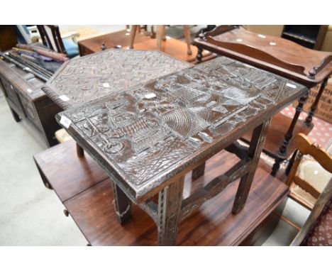 A tribal art style carved table, width approx. 56cm