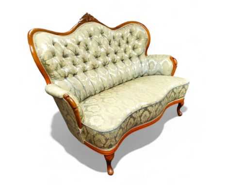 A small French salon sofa, with serpentine shaped button back, cabriole legs, 137cm wide 