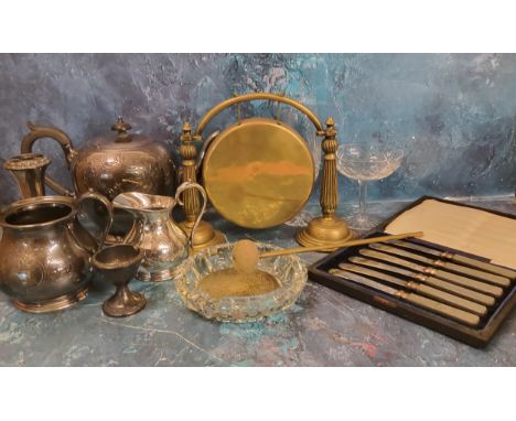 A brass table gong;&nbsp; plated teapot, milk jug and sugar bowl;&nbsp; etc 