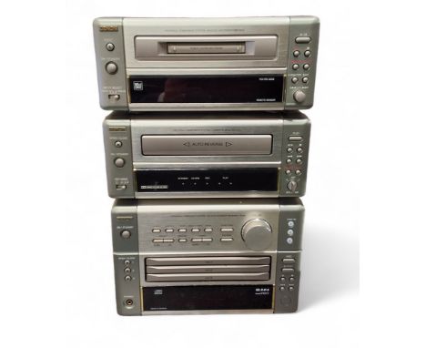 A Denon Personal Component System including CD Auto Changer Receiver UD -M5; Cassette Deck DRR-M10 and M ini Disc Recorder DM