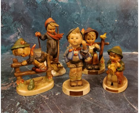 A Goebel figure, designed by M I Hummel, Skier, 13.5cm high, printed marks;&nbsp; others, She Loves Me, Home From Market, Sin
