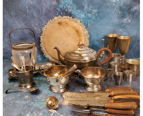 Plated Ware - a three piece E.P.N.S. tea service;&nbsp; a plated bread board;&nbsp; horn hafted flatware;&nbsp; etc 