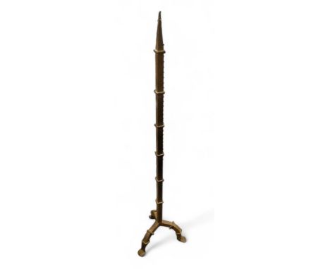 A 19th century cast iron pricket stick, 111cm high 