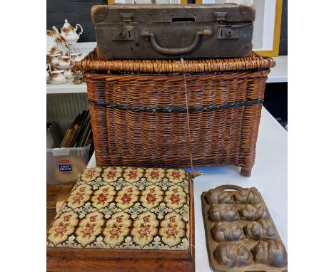 A Victorian walnut foot stool, tapestry top, 31cm wide, c.1870;&nbsp; a fishing basket;&nbsp; a suitcase;&nbsp; etc 