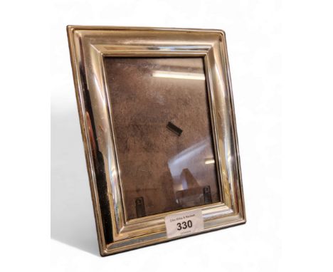 A silver rectangular easel photograph frame, 19.5cm high, Sheffield 1998 