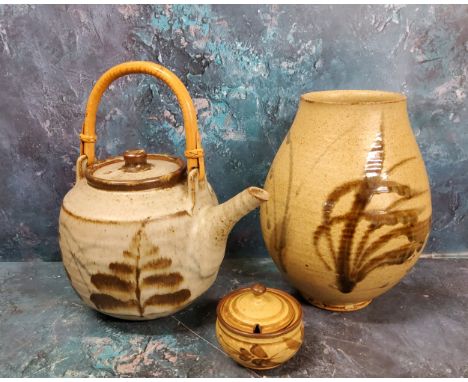 A Studio Pottery teapot, in the Cornish manner, bamboo handle, 30cm high, seal mark;&nbsp; a similar ovoid vase, 24cm high;&n