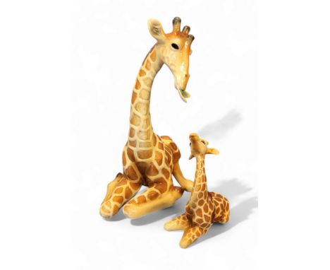 A Franz model, of a giraffe, 19cm high, printed mark, F400278;&nbsp; a Franz giraffe calf, F200486 (2) 