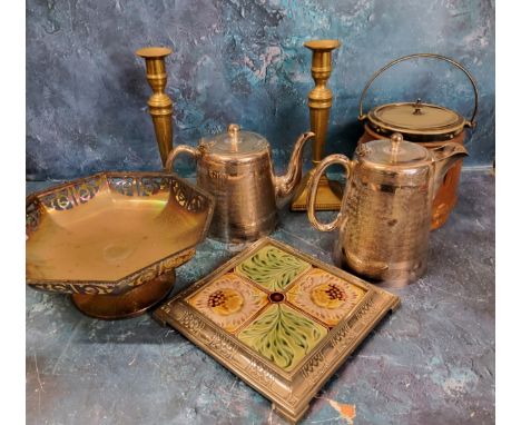 A pair of 19th brass table candlesticks, 24cm high; a plated comport, tea and hot water pot;&nbsp; &nbsp;an early 20th centur