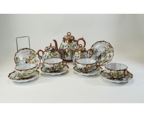 Japanese Very Fine Porcelain ( 13 ) Piece Tea Service, Highly Decorated with Painted Scenes of Japanese Figures and Landscape