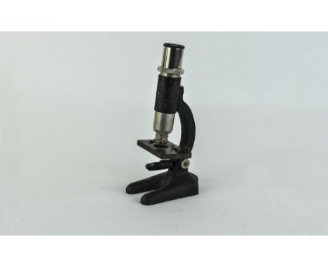 A Vintage Juniors / Starter Microscope, Complete With Lidded Box In Good Condition. Height 7 Inches.