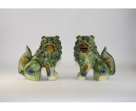 Chinese 20th Century Pair of Ceramic Temple ( Foo ) Dogs. Height 8 Inches. Both Figures are In Excellent Condition. 