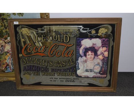 Ice Cold Coca Cola Framed Advertising Sign Mirrored Glass 37x27 InchesTogether with a large tapestry in gilt frame. 