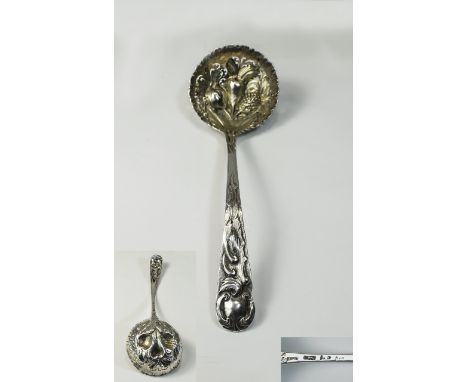 George II Silver Embossed Preserve Ladle. Hallmark London, Date Letter Rubbed. Makers Mark J, Not Distinct. 38.4 grams, 6.25 