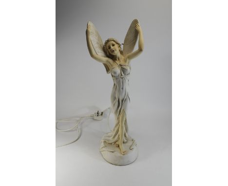 Late 20th Century Hand Painted Figural Table Lamp In The Form of a Mythical Woman with Wings. Marked to Underside. Stands 22 