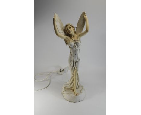 Late 20th Century Hand Painted Figural Table Lamp In The Form of a Mythical Woman with Wings. Marked to Underside. Stands 22 