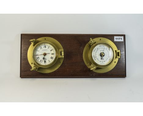 Brass Cased Barometer And Clock Modelled As Portholes By GRM Of England, Mounted On A Mahogany Wall Plaque