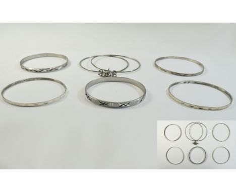 Mixed Lot of 6 Silver Sleigh Bangles, engine turned, bright cut decoration. 