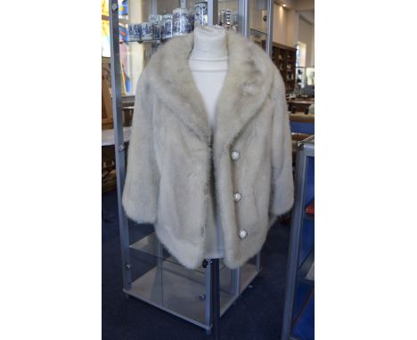 Ash Blonde Mink Opera Jacket, three quarter sleeves, slit pockets on the princess seam line, fastened with three crystal stud