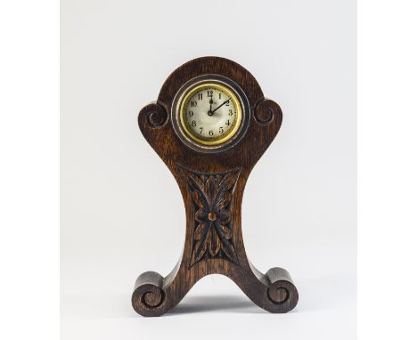 Art Nouveau Oak Cased Mantel Clock with Carved Floral Front Panel 8 Day Movement. c.1900 - 1910. Stands 8.75 Inches High. 
