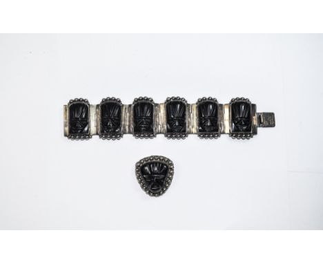 Mexican 1930's Solid Silver Bracelet, Set with Six Black Obsidian Masquette Carvings of Inca Masks. Marked Silver 925 + a Mat